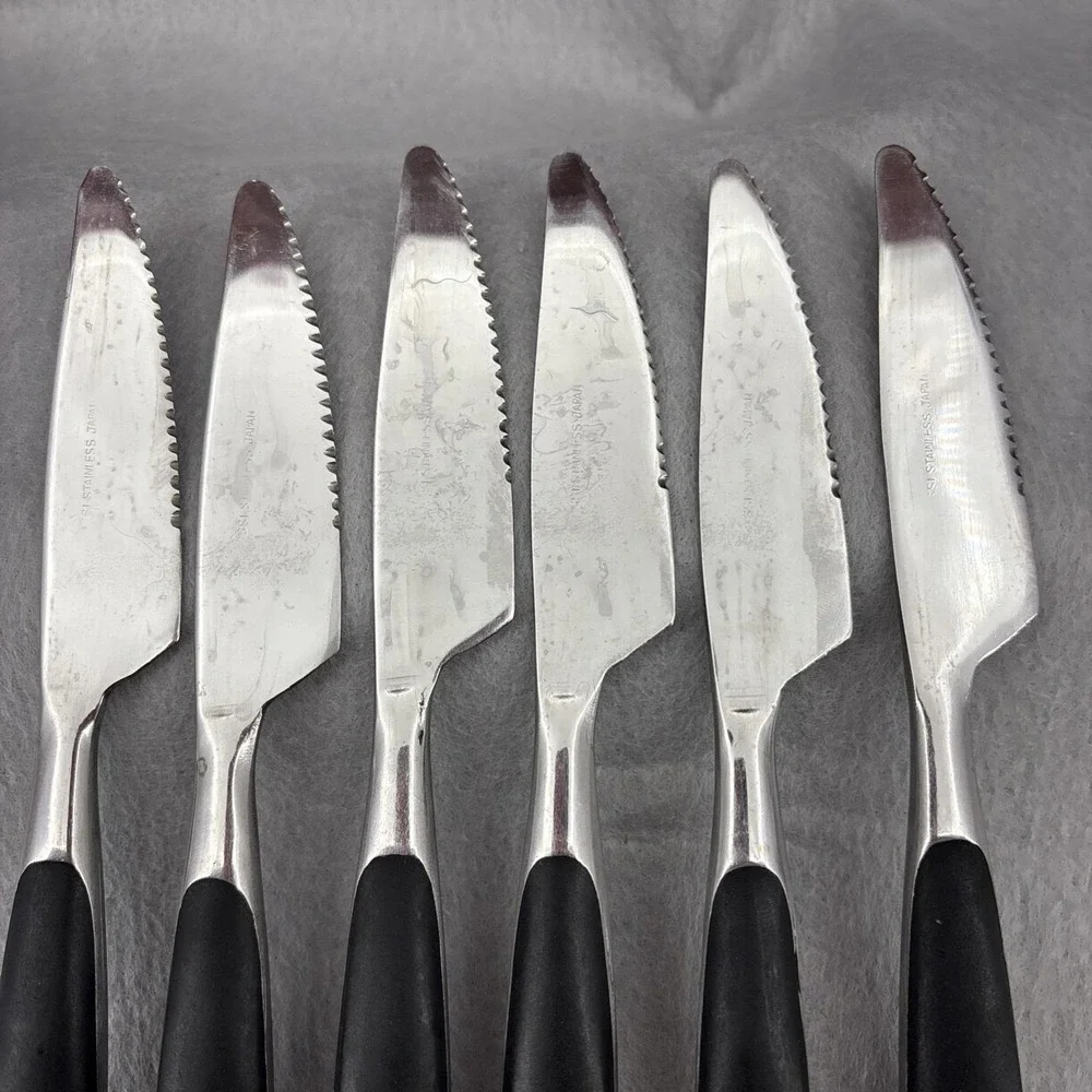 SSI Stainless Japan Black Canoe Style Resin Handle Serrated Edge Dinner Knife 6‎